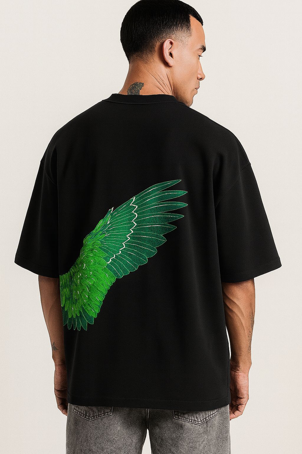 green wing back graphic oversized tee